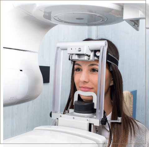 Woman getting scan of her jaw using advanced dental technology in Oklahoma City