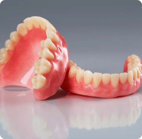 Set of dentures on table